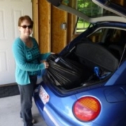 putting donations in car